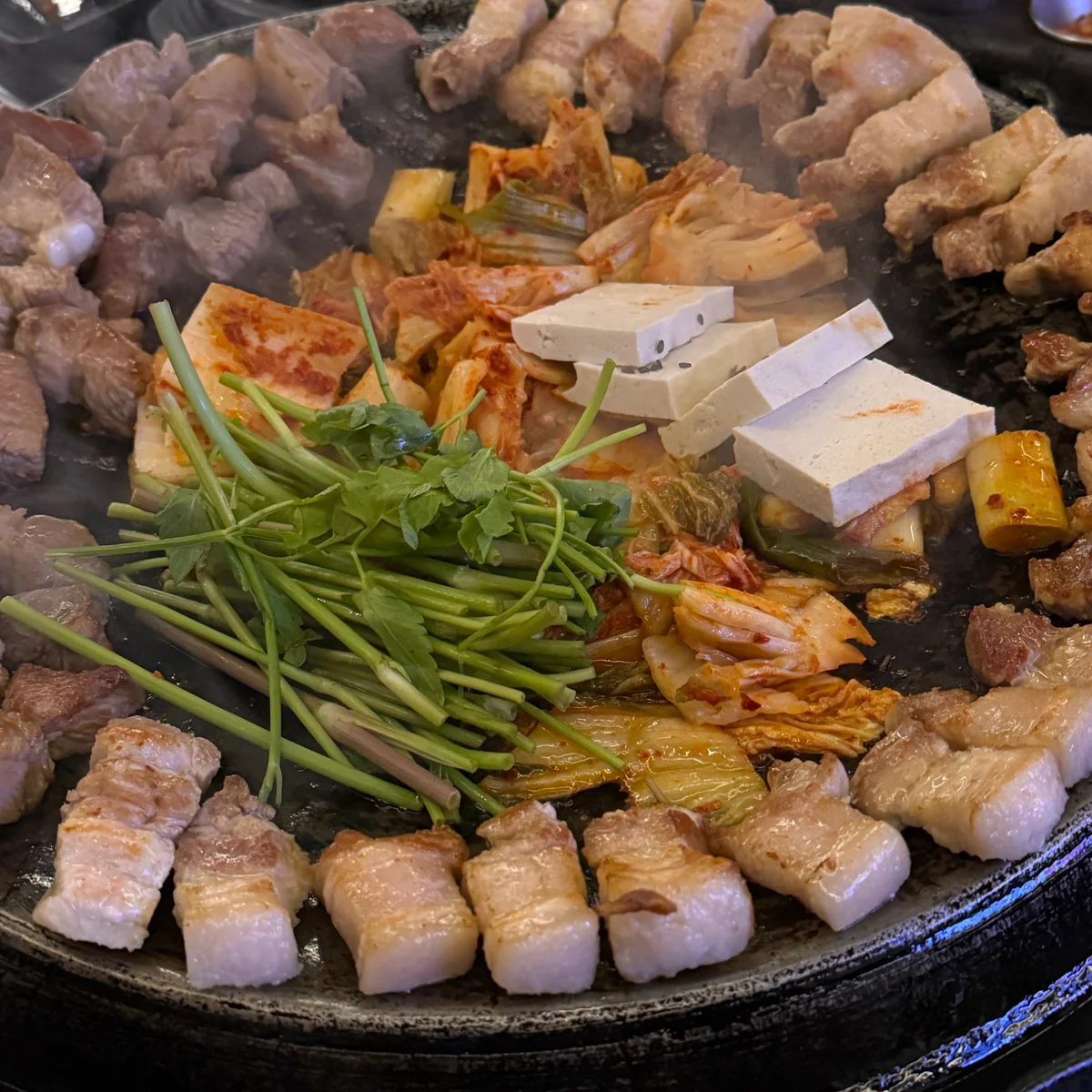 Grilled pork, steamed egg, and highball served at Sotdon (솥돈)